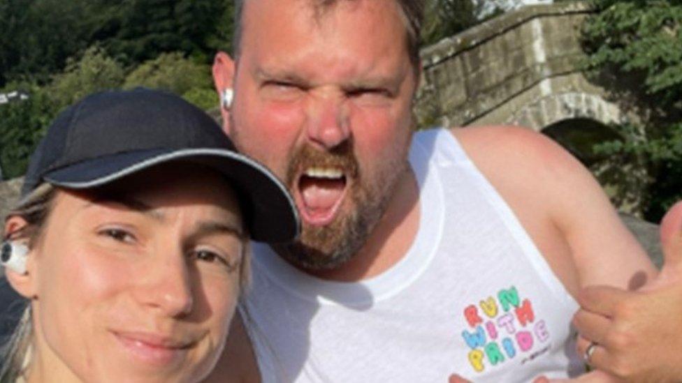 Alex Dawson, pictured with wife Sarah, on a training run