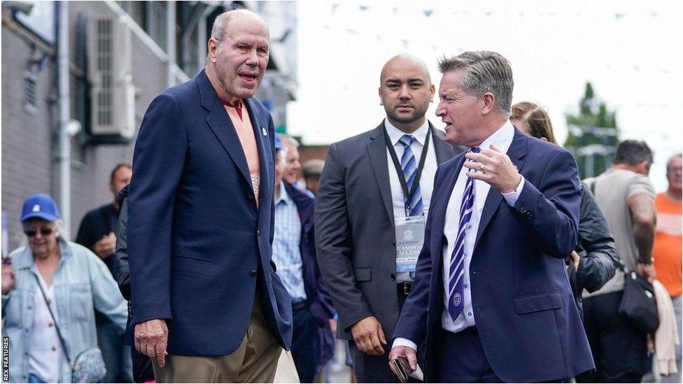 Portsmouth owner Michael Eisner and Andrew Cullen attend the League One match between Portsmouth and Bristol Rovers at Fratton Park