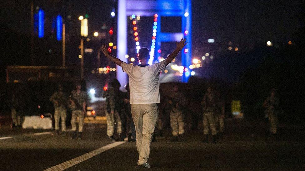 A man approaching the military on the Bosphorus Bridge