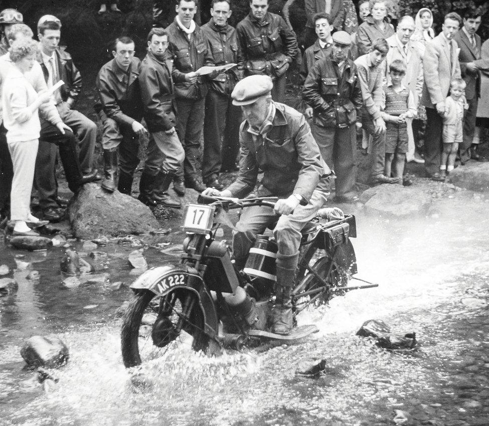 C.H Wood riding the same bike, with new registration