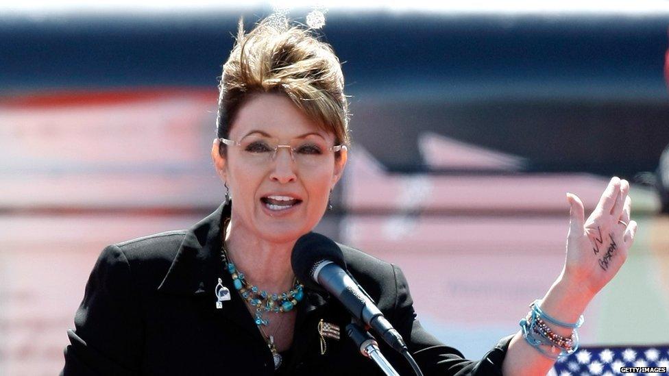 Former Alaska Gov. Sarah Palin jokes about having writing on her hand as she speaks at the Tea Party Express' 'Showdown in Searchlight,' rally 27 March 2010