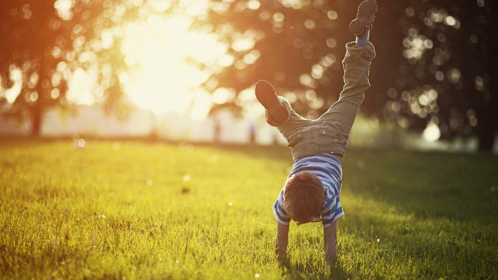 child-doing-a-handstand.