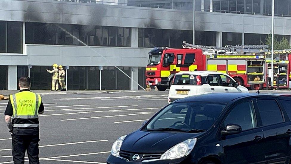 Firefighters at a blaze in UU campus