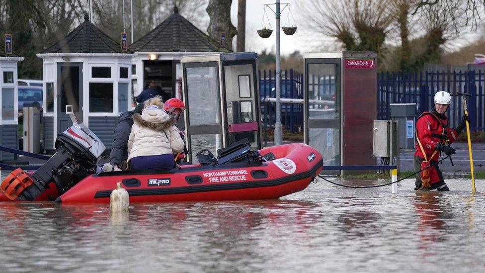 People being rescued on boat