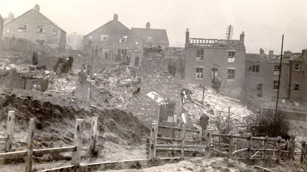 Bomb damage on Old Stoke Road, in January 1941.