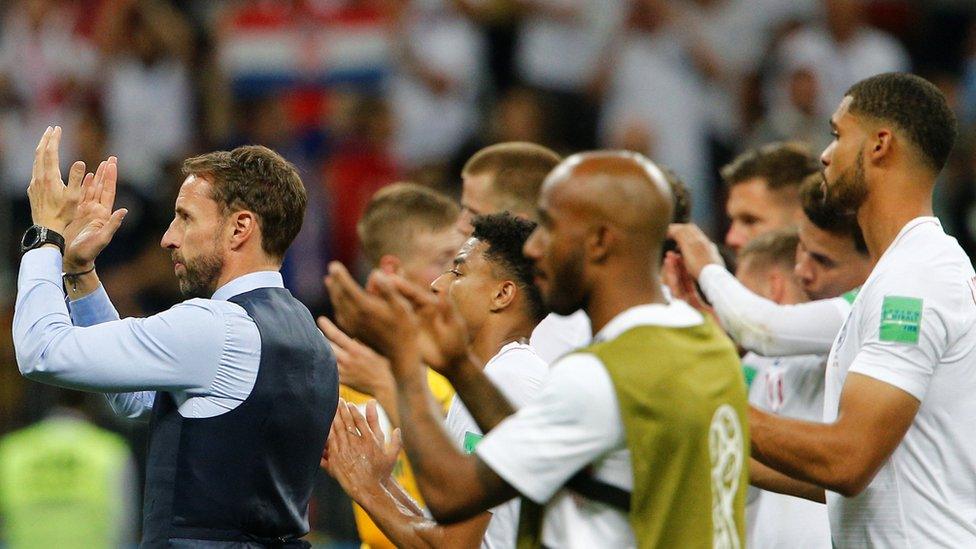 Southgate claps after england lose 2018 world cup semi-final.