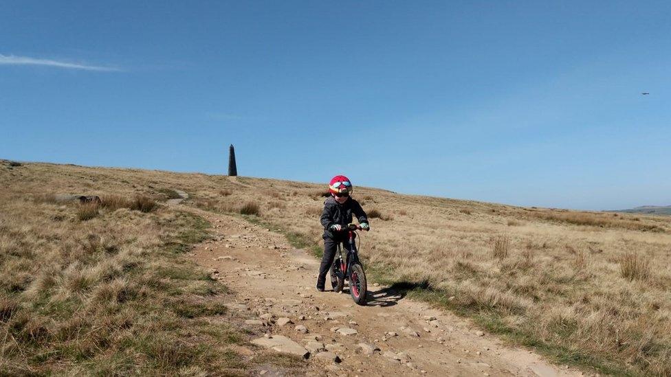 Claire Millington's son cycling during the coronavirus pandemic