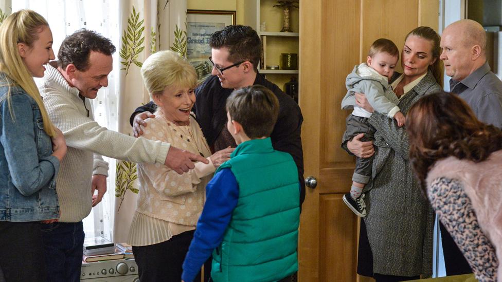 Mitchell family greets Peggy (Barbara Windsor)