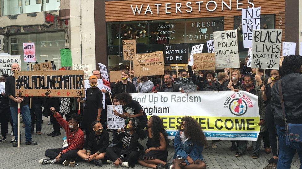 People holding banners