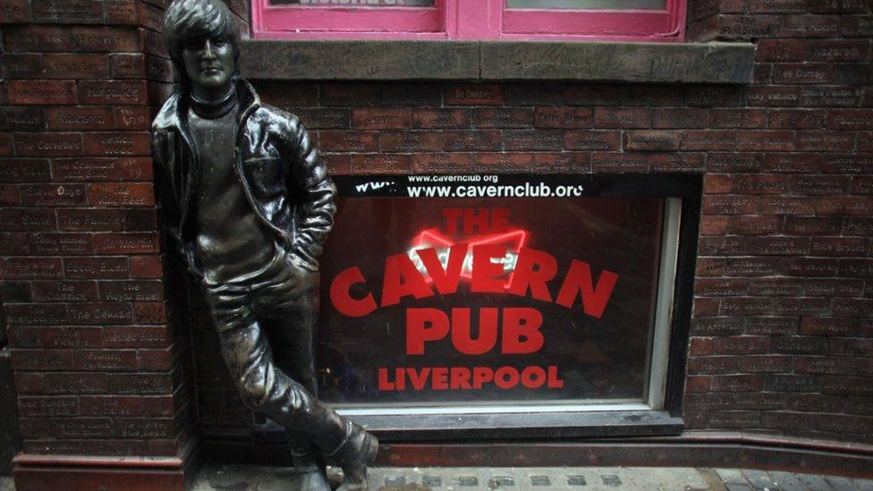 A statue of John Lennon stands outside the Cavern Pub in Mathew Street on January 27, 2012 in Liverpool, England. With six months to go until the opening ceremony of the London 2012 Olympic games Britain's tourist industry is gearing up to cater for the influx of athletes, officials and visitors.