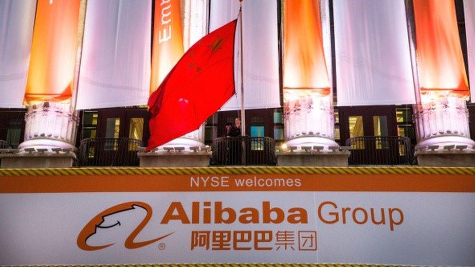 Alibaba Group signage is posted outside the New York Stock Exchange prior to the company's initial price offering (IPO) on September 19, 2014 in New York City.