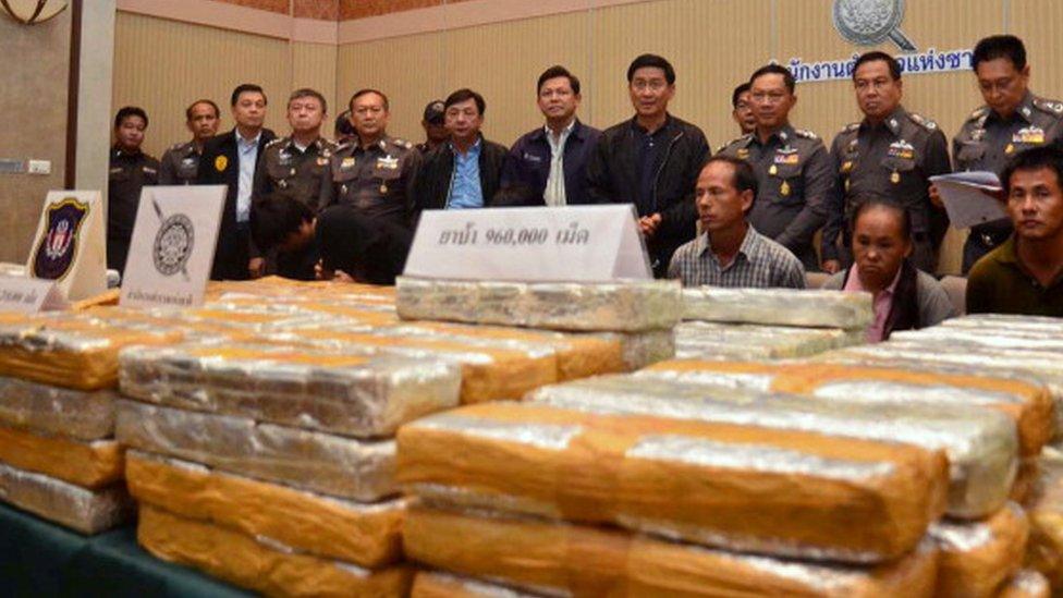 Illegal methamphetamine pills on display at a police bureau in Bangkok (18 August 2013)