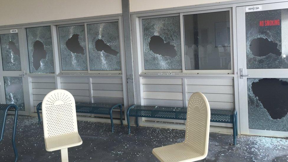 Photo of broken windows at Christmas Island detention centre