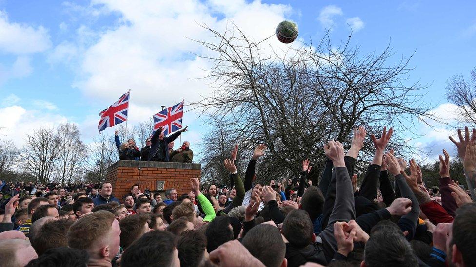 Andrew Lemon throws the ball into the crowd