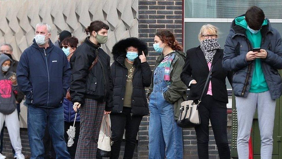 People queuing outside walk-in test centre in Liverpool