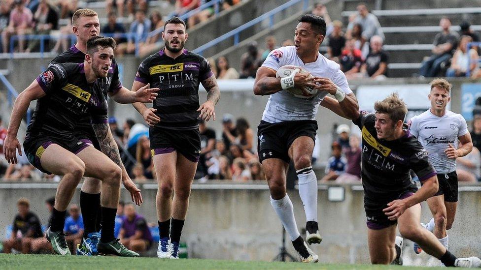 Toronto Wolfpack's Quentin Laulu-Togaga'e (in white)