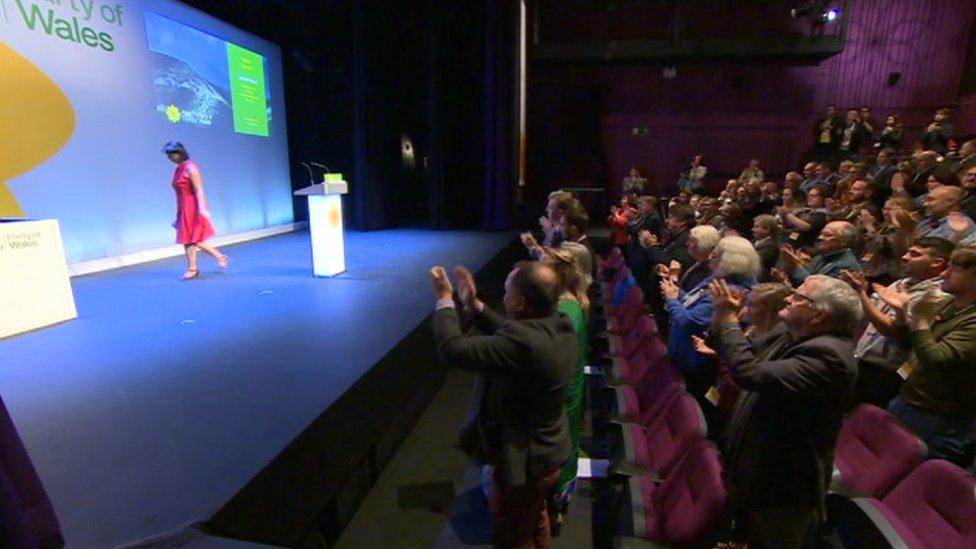 Standing ovation at the conference stage