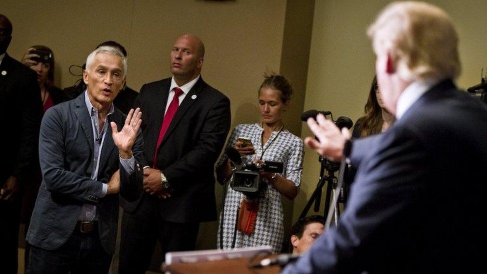 Republican presidential candidate Donald Trump spars with Univision reporter Jorge Ramos during a news conference hosted by Mr Trump news on Tuesday