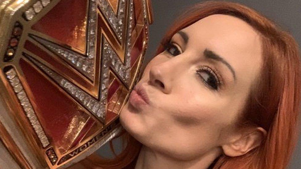 Wrestling-superstar-Becky-Lynch-kissing-her-Championship-belt