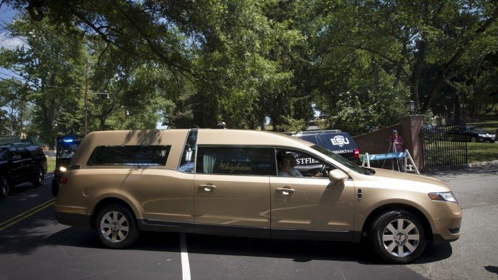 Hearse passes through the gates into Fairview cemetery, 3 Aug