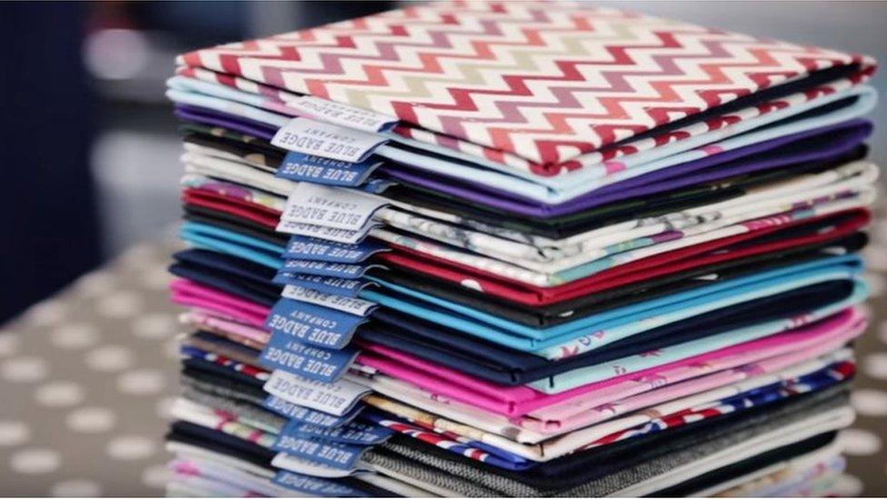 Stack of Blue Badge card wallets in a variety of colourful designs