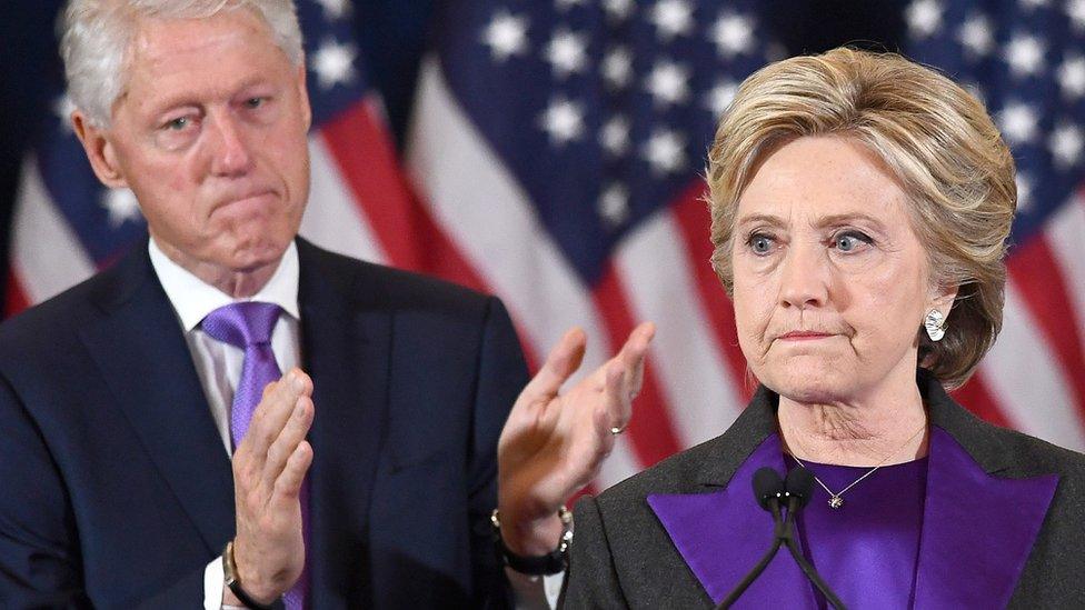 Hillary Clinton makes a concession speech after being defeated by Republican President-elect Donald Trump, as former President Bill Clinton looks on in New York - November 9, 2016