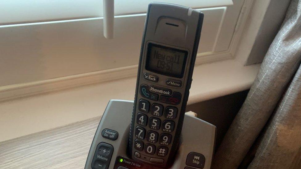 A photo of a landline phone