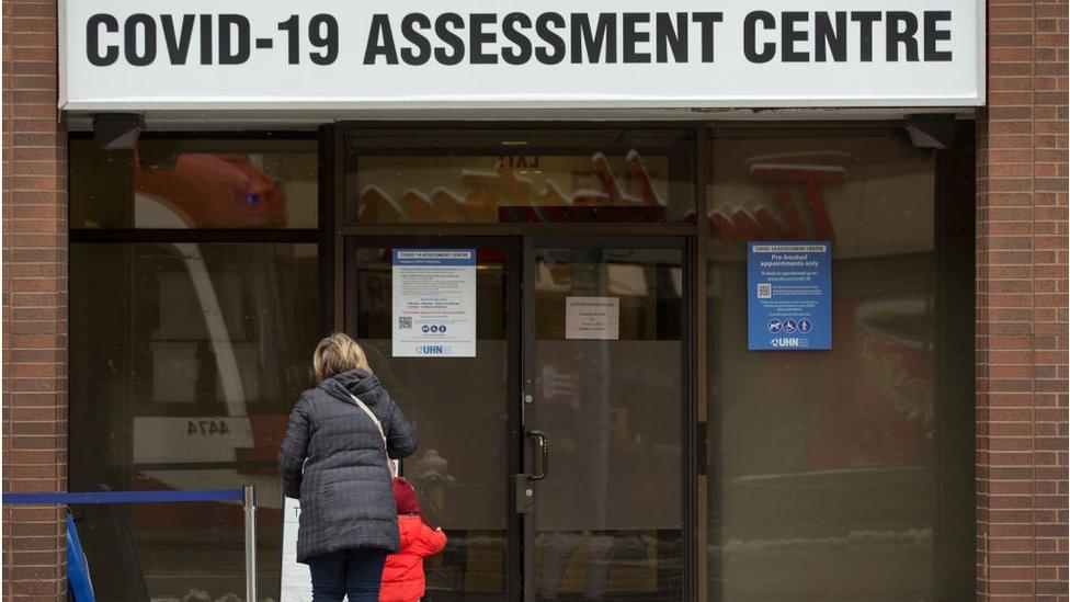 People line up on Christmas Day at a Covid test site in Ontario