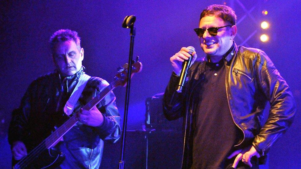 Paul and Shaun Ryder on stage in 2012