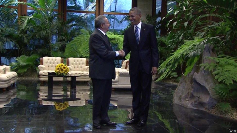 President Obama shaking hands with President Castro