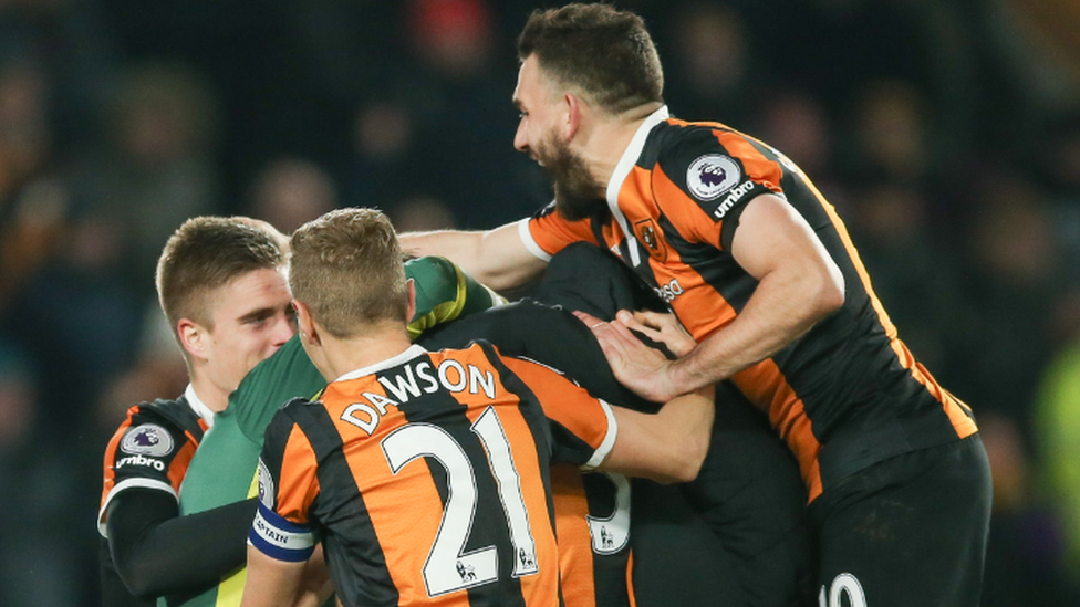 Hull City players celebrate after reaching the EFL Cup semi-final