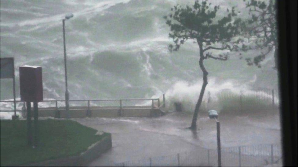 Waves crashed against the Hung Hom Promenade in Hong Kong during Typhoon Mangkhut, 16 September 2018