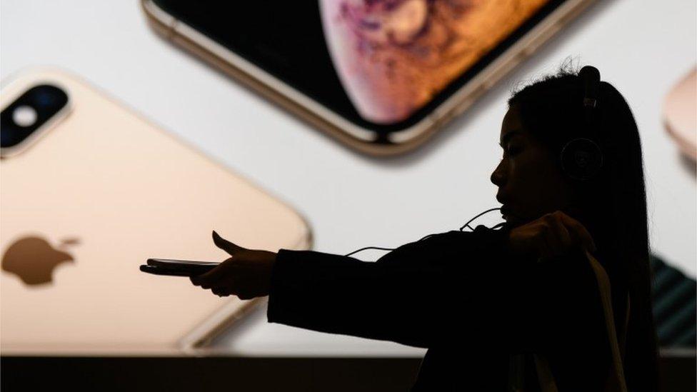 Apple customer in front of store