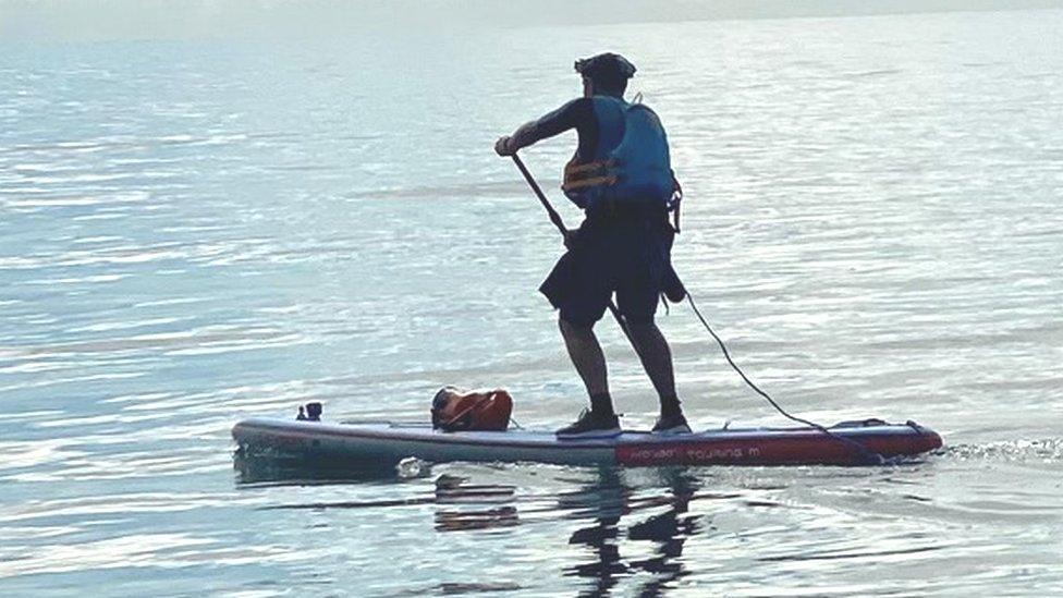 Joe Cartwright on a paddleboard