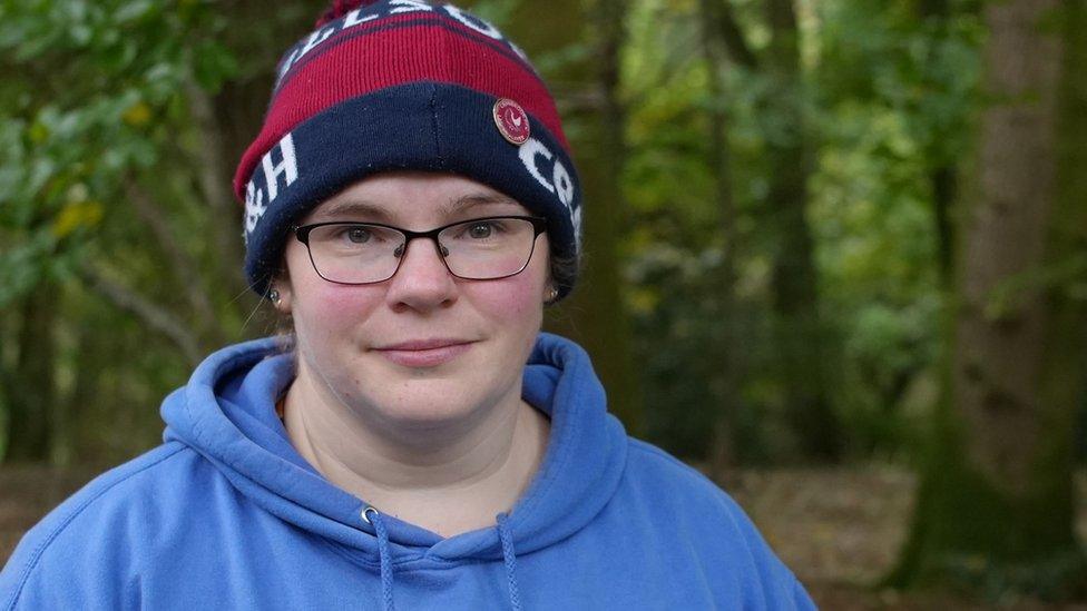 Jo furlong pictured in a woolly hat and glasses