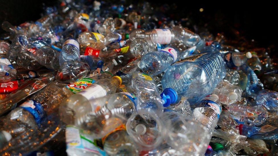 A file image of a pile of plastic bottles at a recycling plant