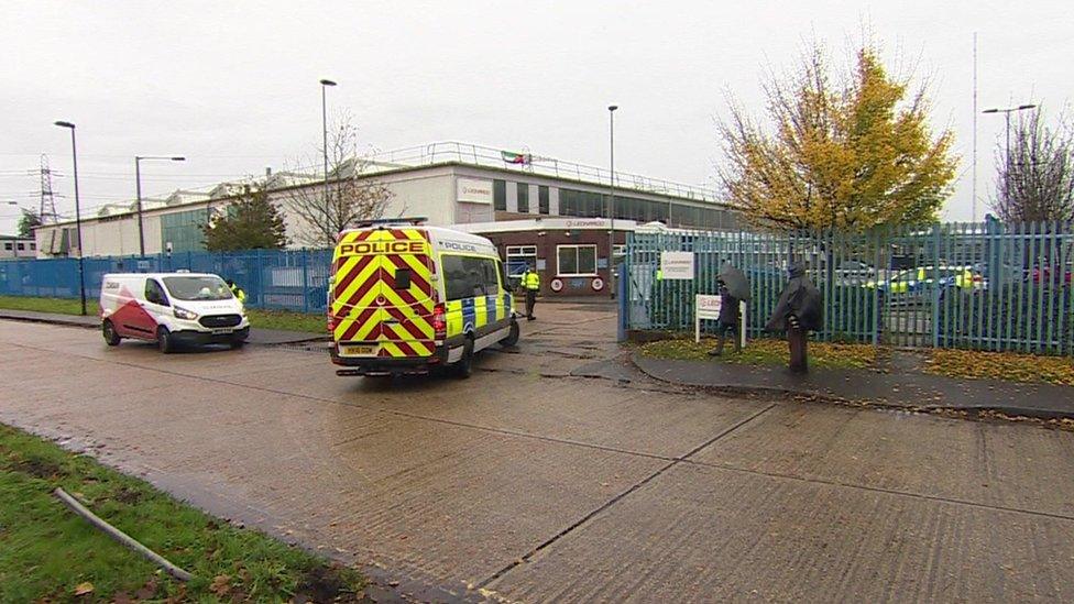 Police van at factory