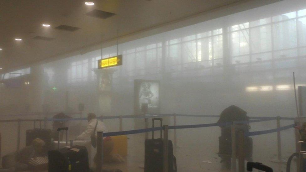 Smoke fills Brussels Airport after suicide attacks