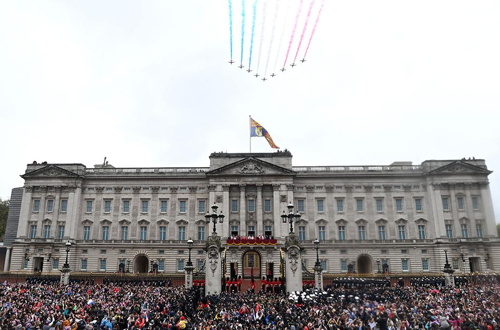 The Royal Family watches the flypast on the balcony