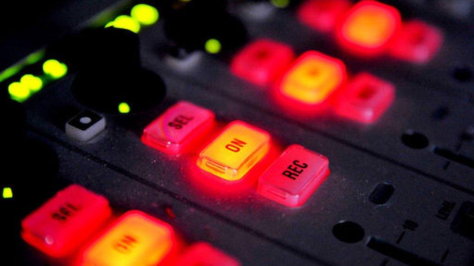 Faders in radio studio