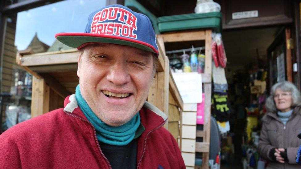 Derek Knapman in front of his shop