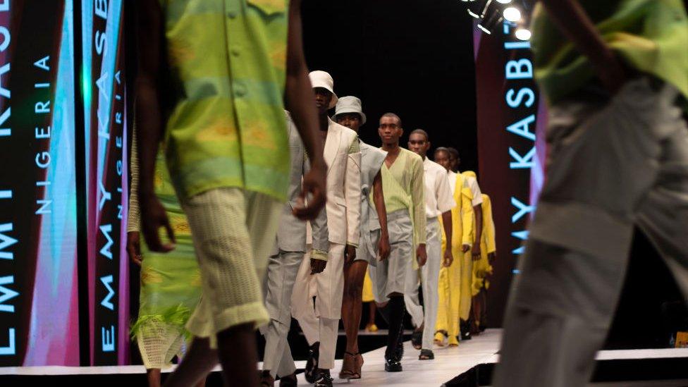 Models walk the runway for Emmy Kasbit, during Lagos Fashion Week 2021 on October 30, 2021 in Lagos, Nigeria.