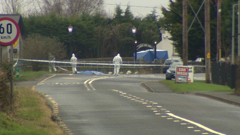 Forensic investigators searched the area around Lordship credit union after the murder