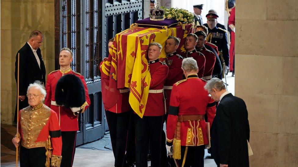 The Queen's coffin entering Westminster Hall