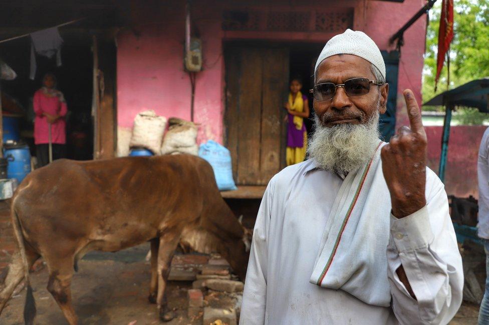 A Muslim man shows his inked index finger after casting his vote in the 2nd phase of General elections in Uttar Pradesh's Agra, Some 200 Kms from National Capital New Delhi , on April 18, 2019.