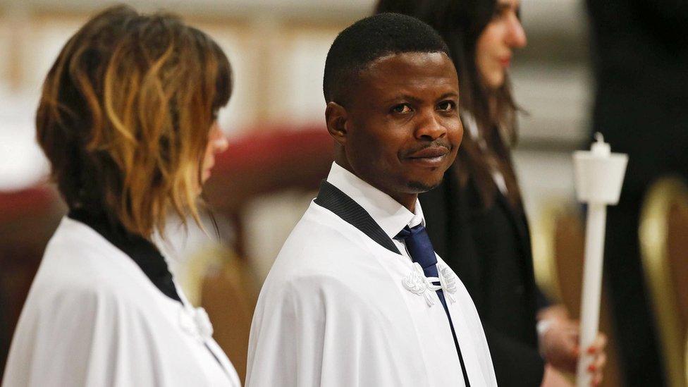 Nigerian John Francesco Ogah during a solemn Easter vigil ceremony in St. Peter"s Basilica at the Vatican.