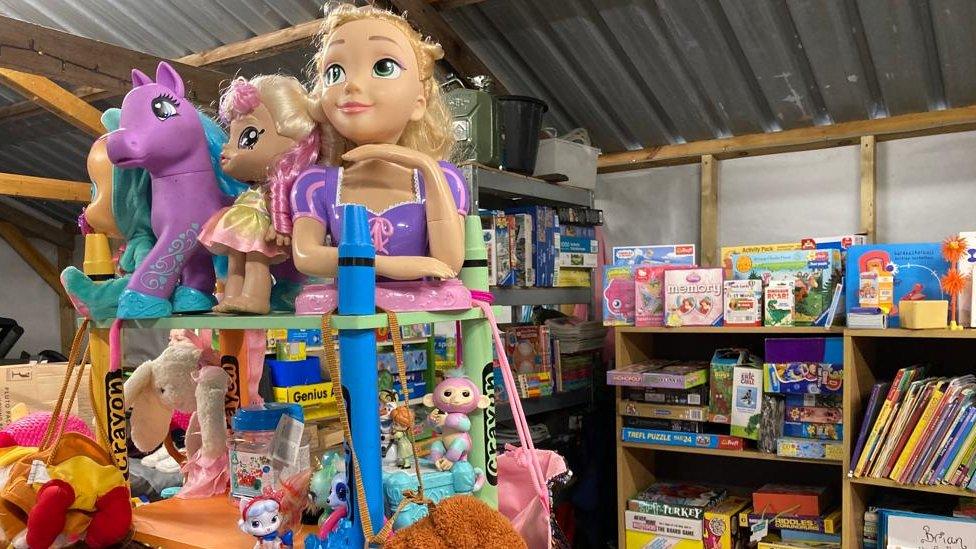 Toys piled on tables