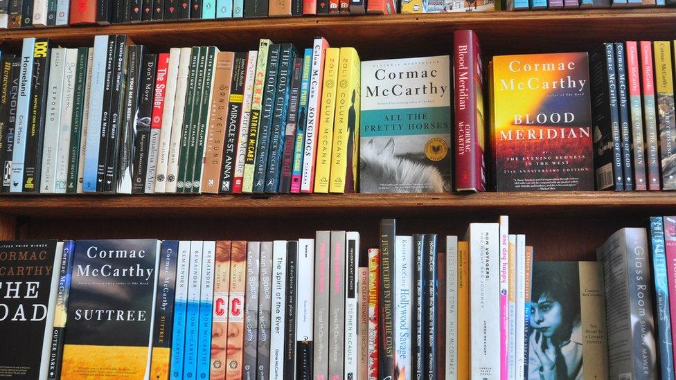 Cormack McCarthy's novels and books by other writers in a bookshop. File photo