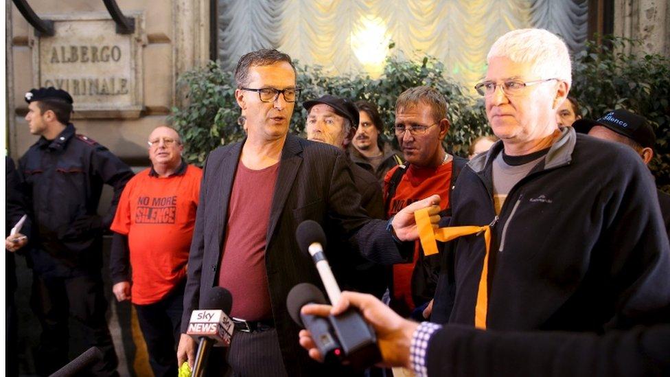 Australian child abuse victim David Ridsdale (right) and other observers arrive at the Quirinale hotel in Rome to hear Cardinal Pell give evidence, 28 Feb 2016