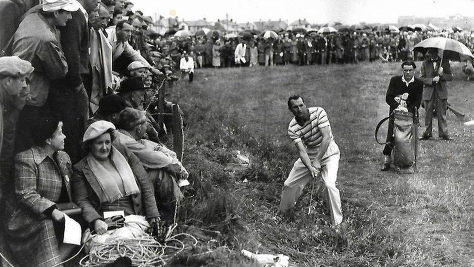 Crowds of people watch Max Faulkner play a shot at Royal Portrush